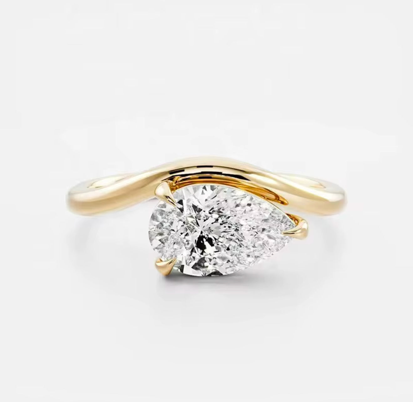 Floating Pear Ring