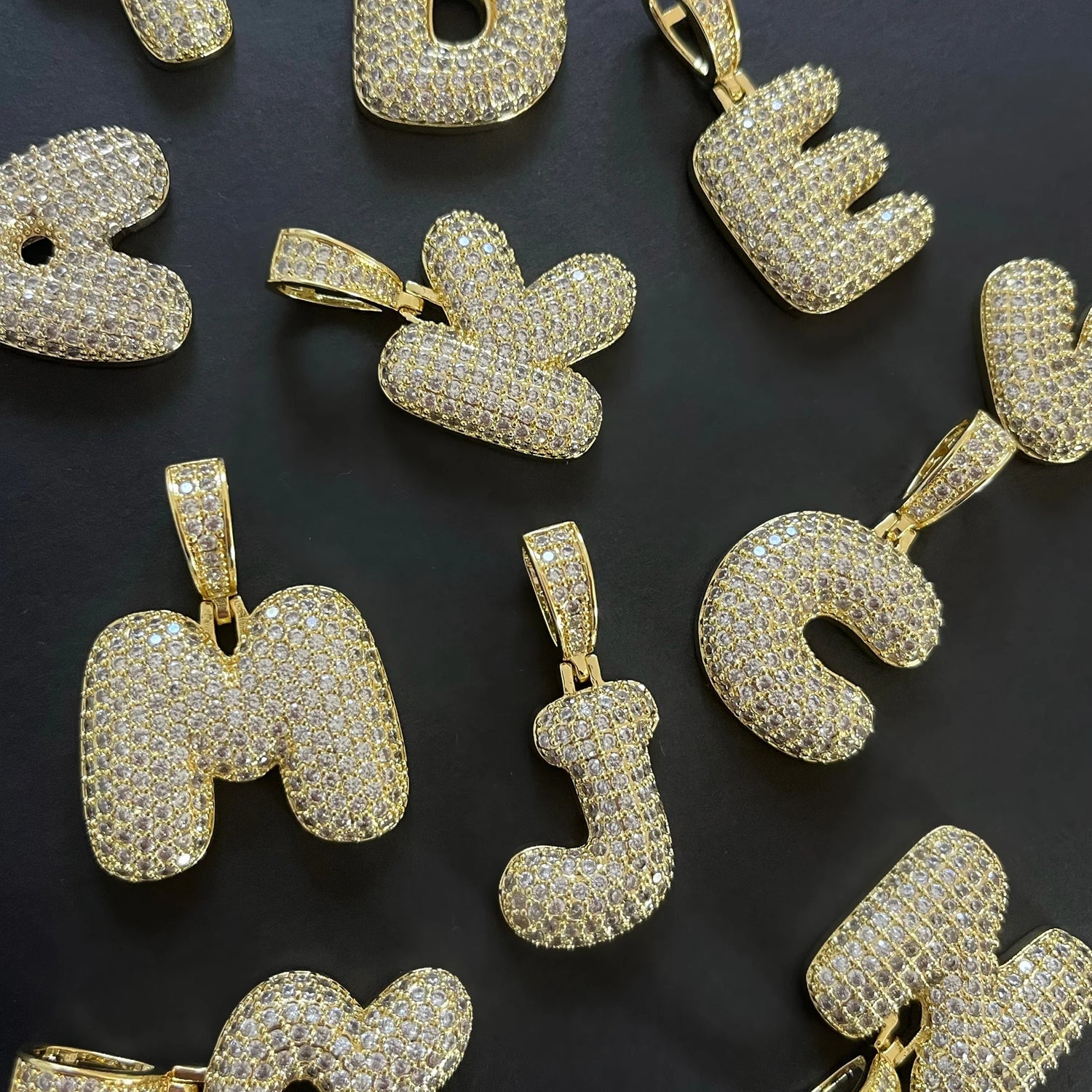 Iced out bubble letter shop pendant